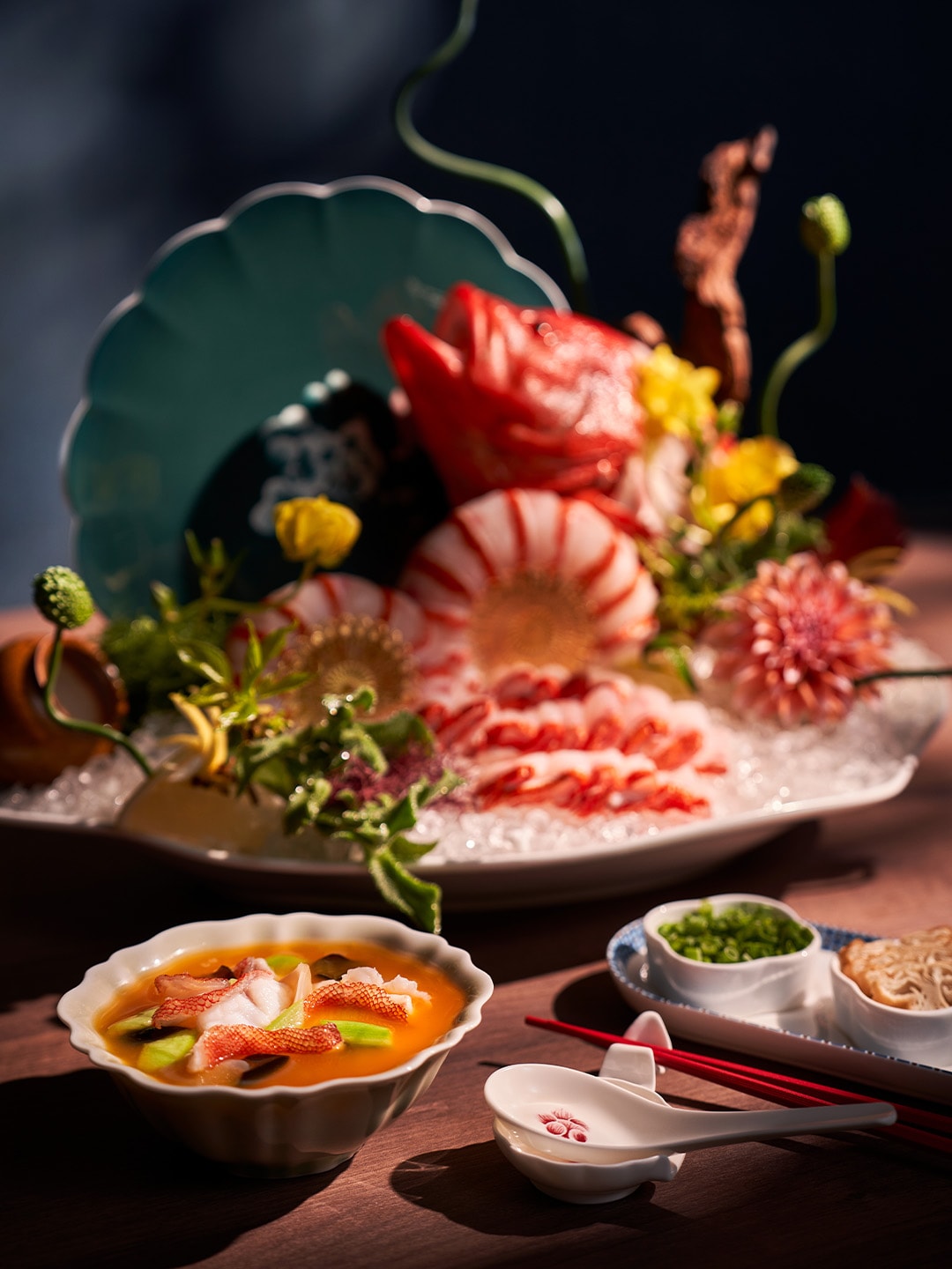 Wild Caught Red Grouper Poached in Lobster Broth at Jin Ting Wan, a Cantonese restaurant in Singapore