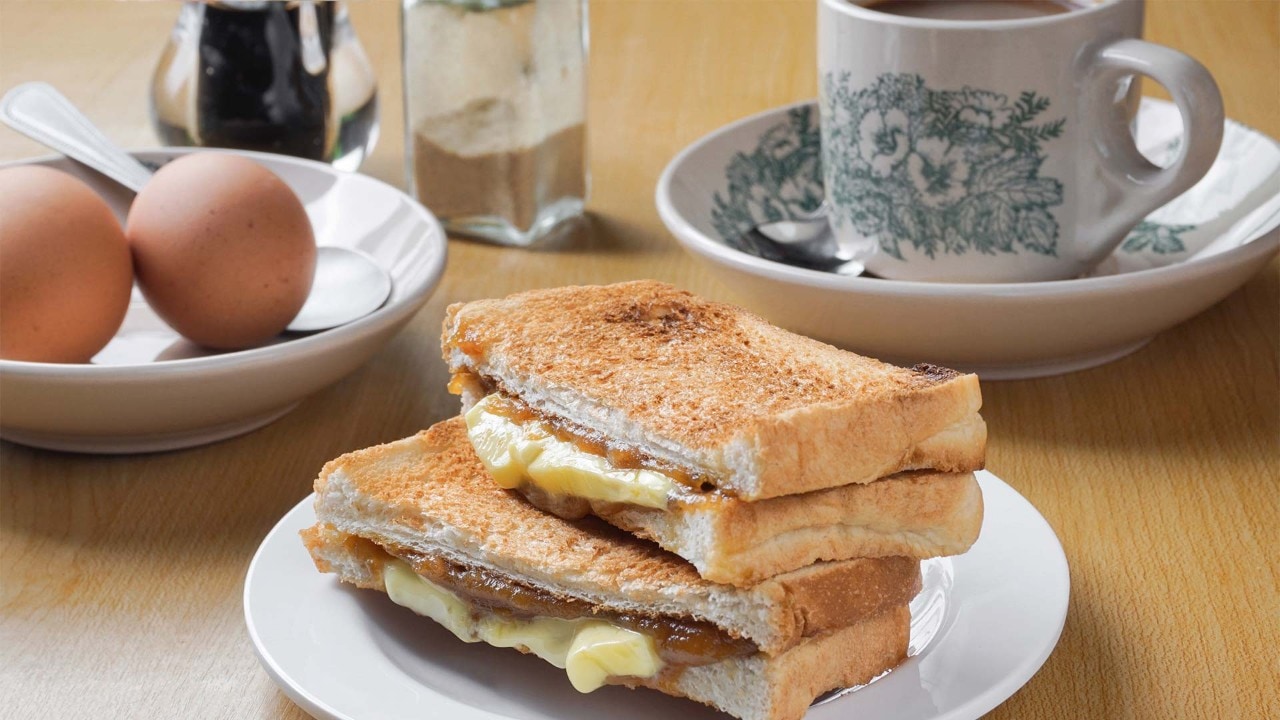 Kaya toast with butter and eggs, a Singapore local favourite for breakfast 