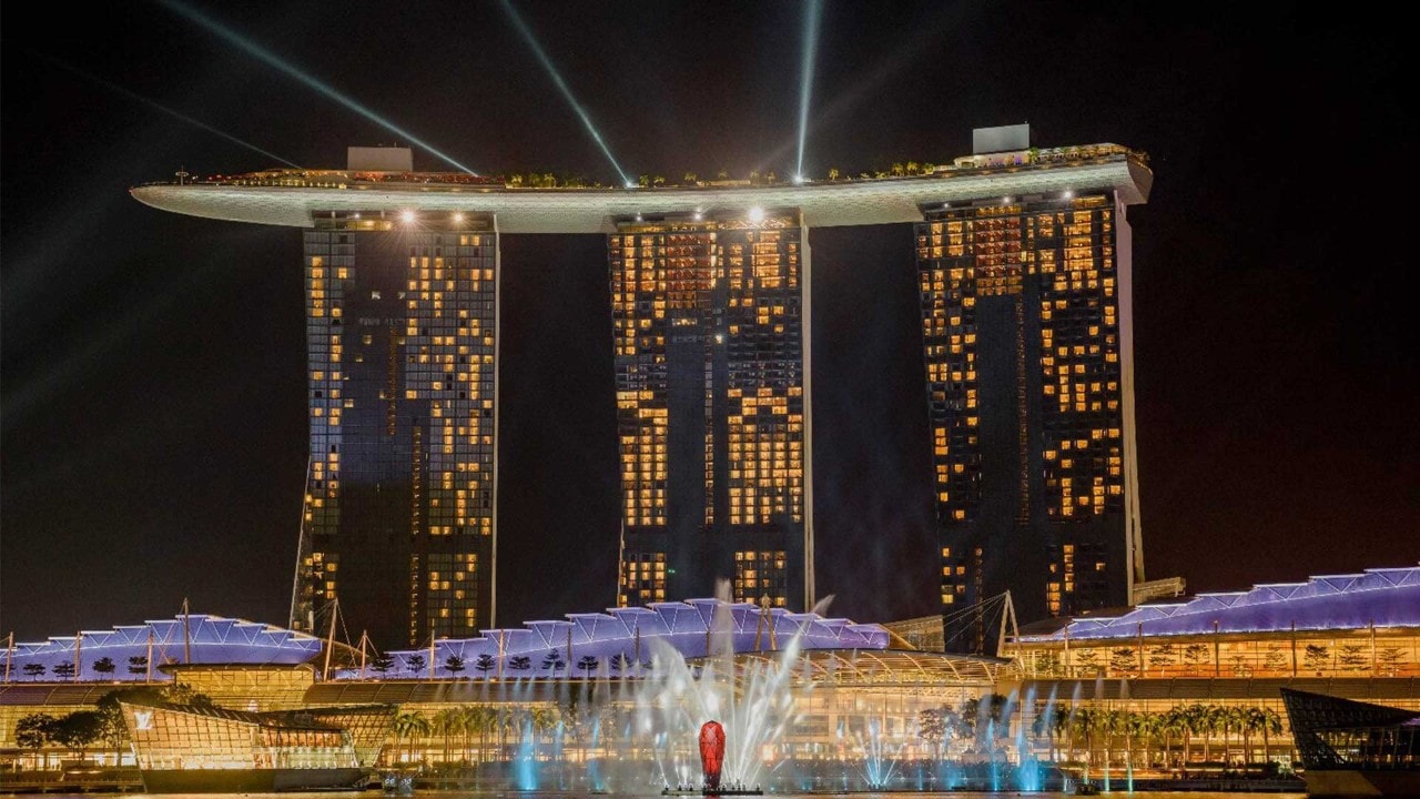 Catch the light and water show with Marina Bay Sands as a backdrop