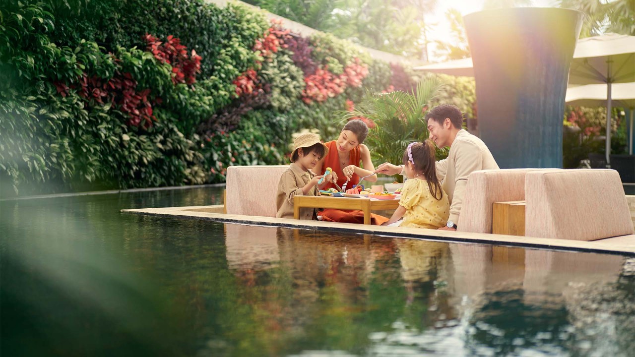 Family of four celebrating Mother's Day with a meal at restaurants in Singapore