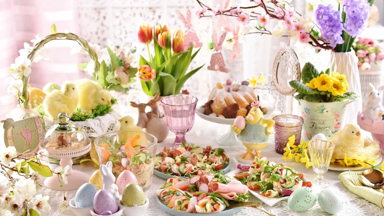 Easter goodies and breakfast on a dining table during Easter Sunday