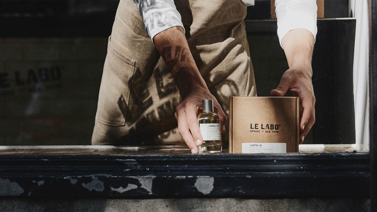 Dried rose petals with a bottle of 'Rose 31' perfume from Le Labo to gift mum this Mother's Day