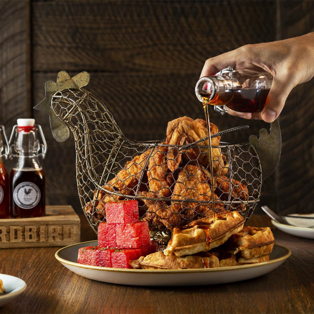 Fried chicken with waffles and watermelon at Yardbird, a casual dining spot in Singapore