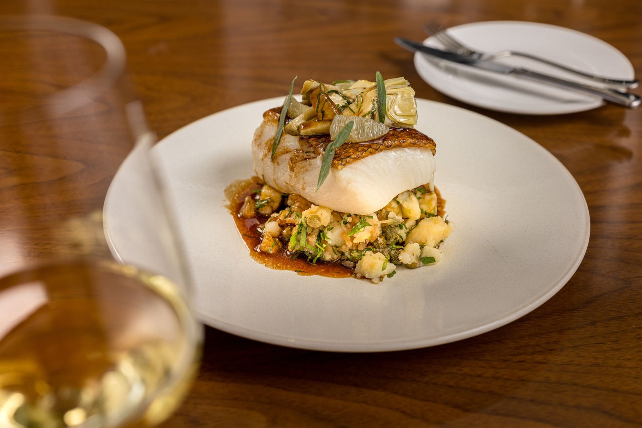 Bread Street Kitchen_Roasted Cod Crushed Potatoes Artichoke Salted Capers Red Wine And Lemon Sauce.jpg