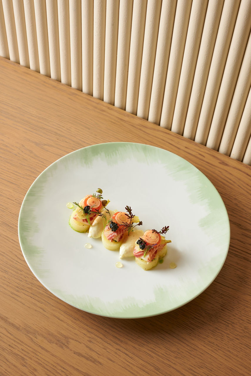 Maison Boulud_Smoked eel with potato confit.jpg