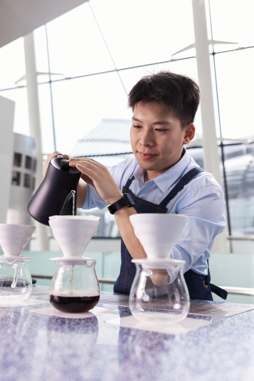 Miracle Coffee_Barista doing pour over_1.jpg