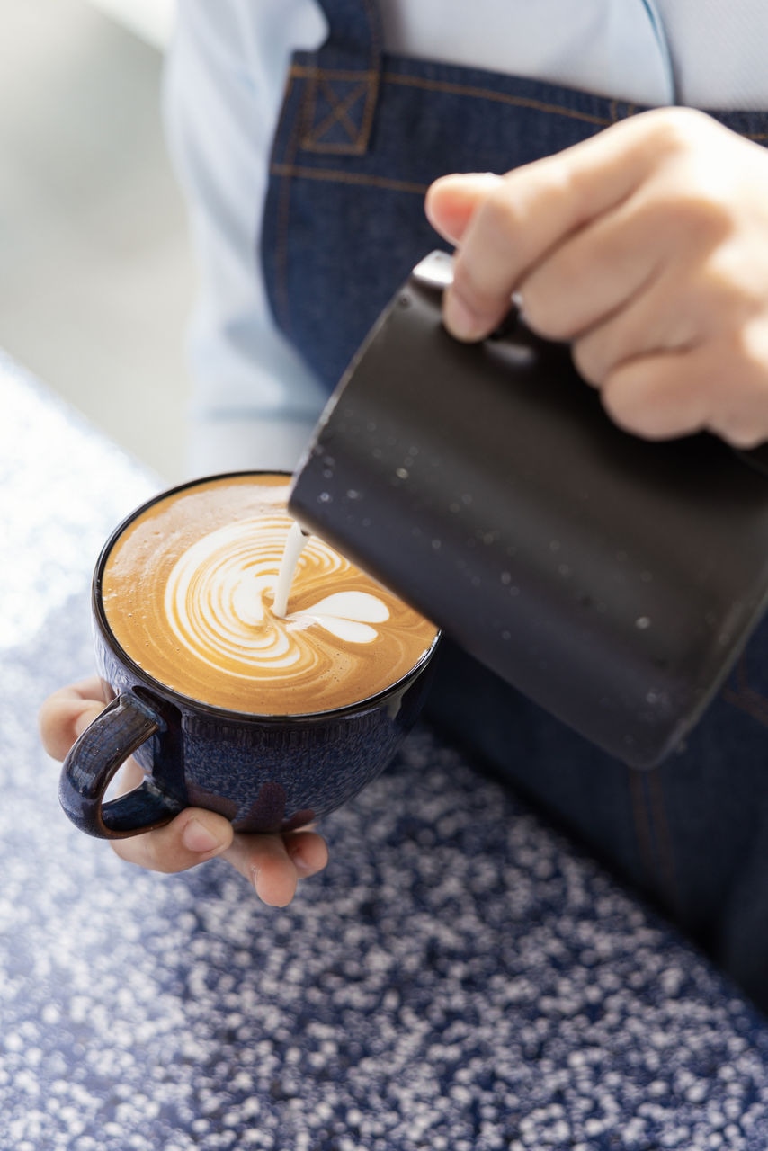 Miracle Coffee_Barista pouring latte art_2.jpg