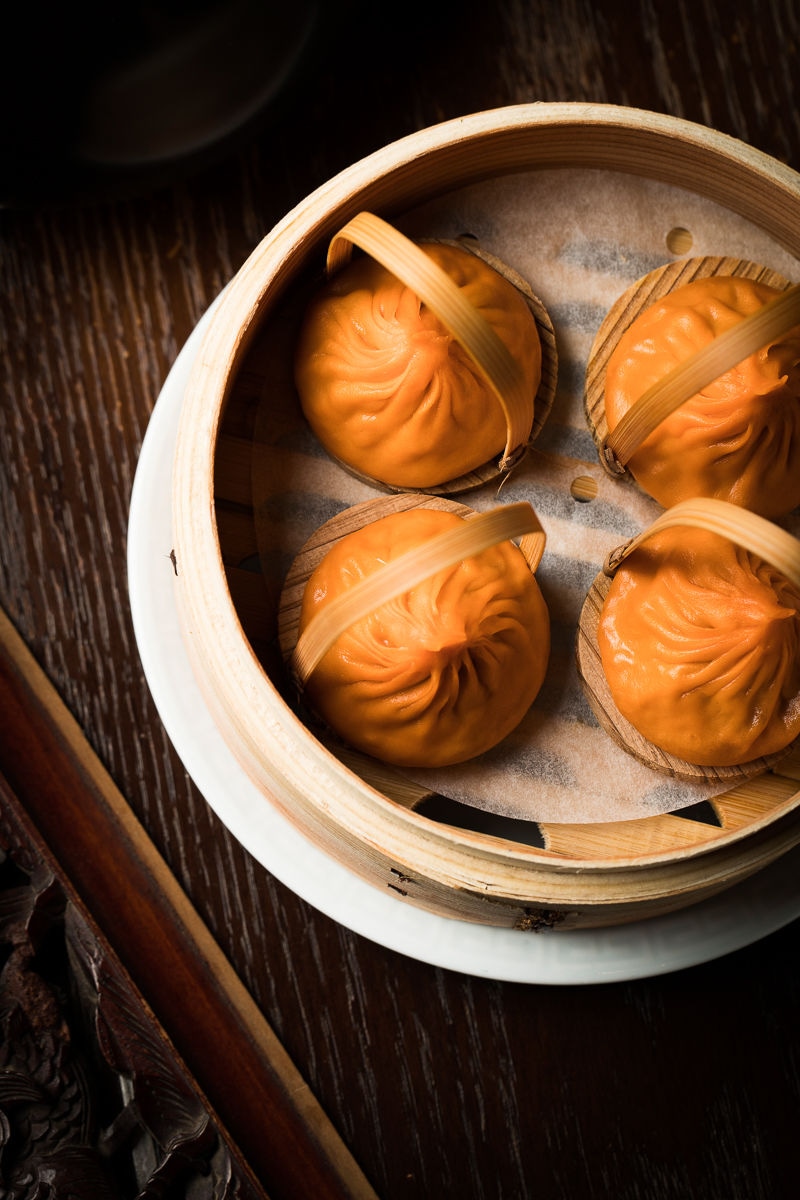 Mott32_Hot _ Sour Soup Dumplings.jpg
