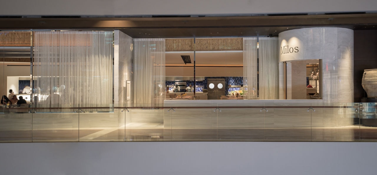 Milos features a marble entrance made from Pendelikon marble and a cylindrical portico_.jpg